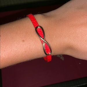 Red and gold infinity bracelet
